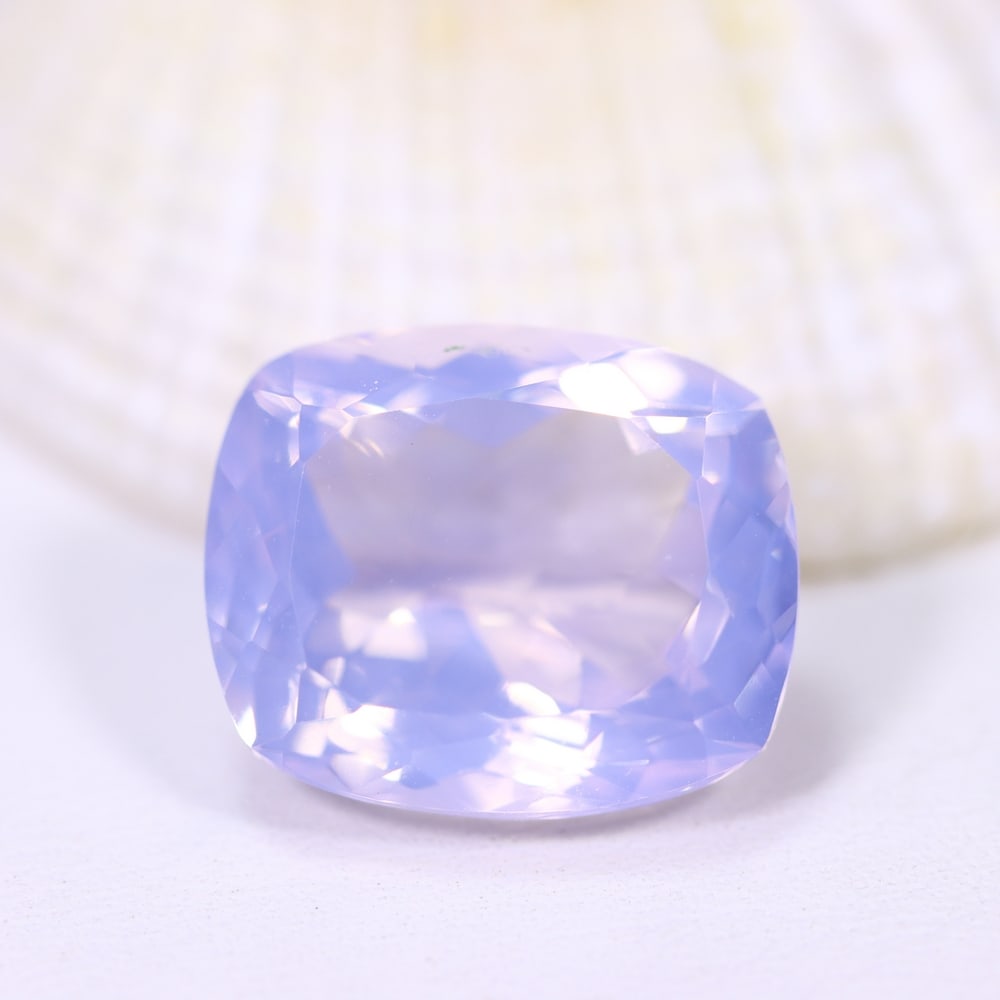 10Ct Lavender Amethyst - Polished Faceted , 1143E: Ksmith Heritage Auctioneers Subject: Natural Lavender Amethyst Origin: Brazil Carat Weight: 10Ct Dimension: 14.6x12.5x8.4 mm Treatment: Untreated Type: Faceted, Polished