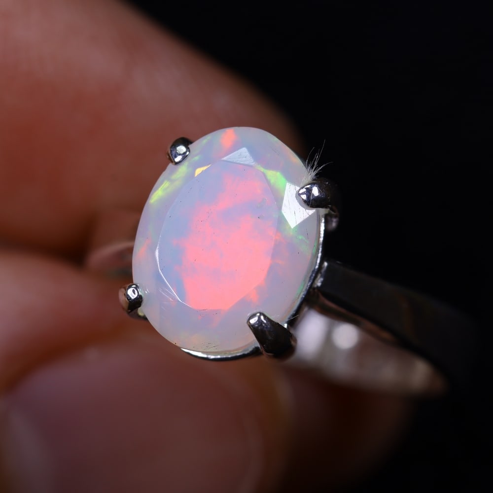 3.28g Natural Opal Stone Sterling Silver 925 Ring (Adjustable) , 70E: Ksmith Heritage Auctioneers Subject: Natural Ethiopian Opal Ring (Silver 925) Origin: Ethiopia Stone Dimension: 11x8mm Treatment: Natural Untreated Type: Faceted, Polished