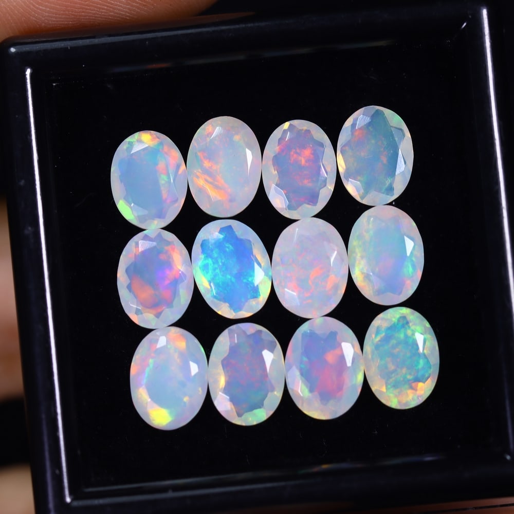 *9.13Ct 12pcs Calibrated 8x6mm Faceted Welo Opal Set - Ethiopian Opal, 127B: Ksmith Heritage Auctioneers Subject: Natural Ethiopian Welo Opal Origin: Ethiopia Carat Weight: 9.13Ct Treatment: Natural Untreated Type: Faceted, Polished