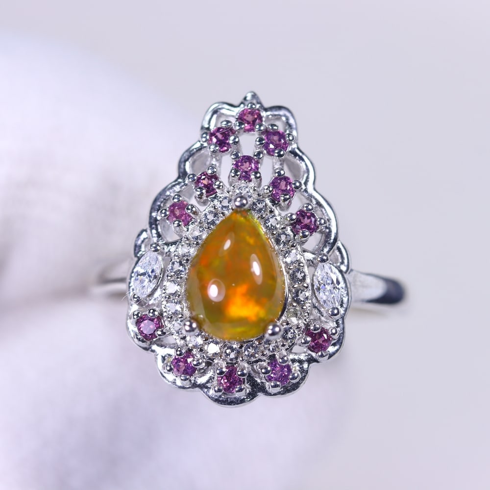 Ring US6.5 Rhodolite Opal & Zircon - 925 Sterling Silver , 806E: Ksmith Heritage Auctioneers Subject: Natural Rhodolite, Zircon & Opal Origin: Thailand Carat Weight: 17.34ct Dimension: Gemstone 6x7.5mm Type: Ring
