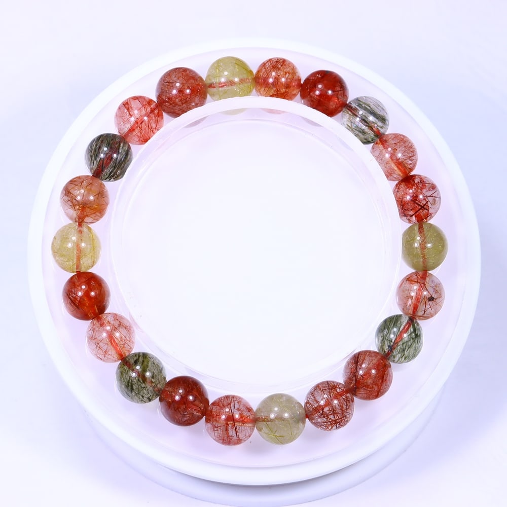 19.70g Rutilate Bracelet - Polished Beads , 831E: Ksmith Heritage Auctioneers Subject: Natural Rutilate Carat Weight: 19.70g