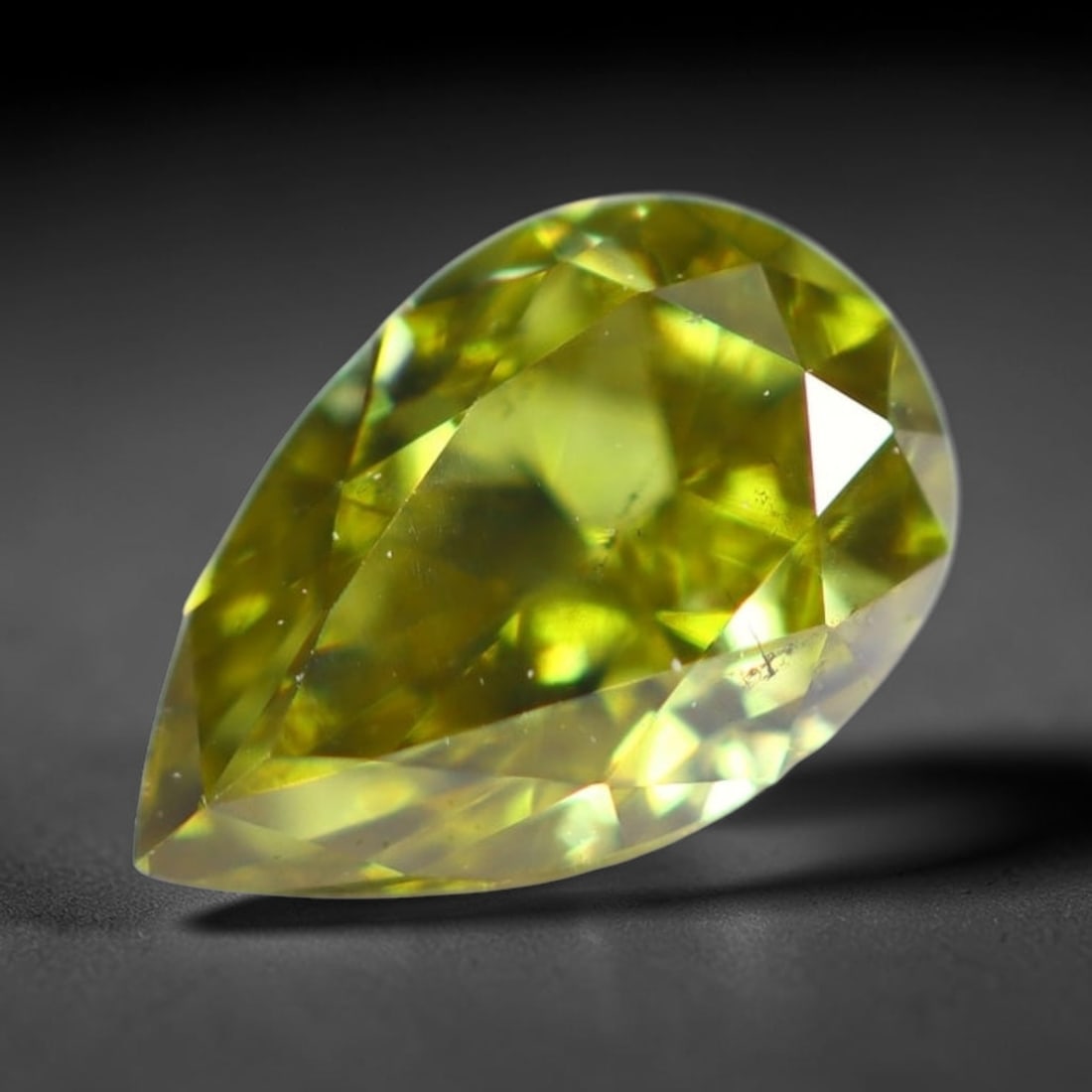 0.24Ct Fancy Diamond - Polished Faceted , 982E: Ksmith Heritage Auctioneers Subject: Natural Diamond Origin: Africa Carat Weight: 0.24Ct Dimension: 4.9x3.2x2 mm Treatment: Unheated Type: Faceted, Polished