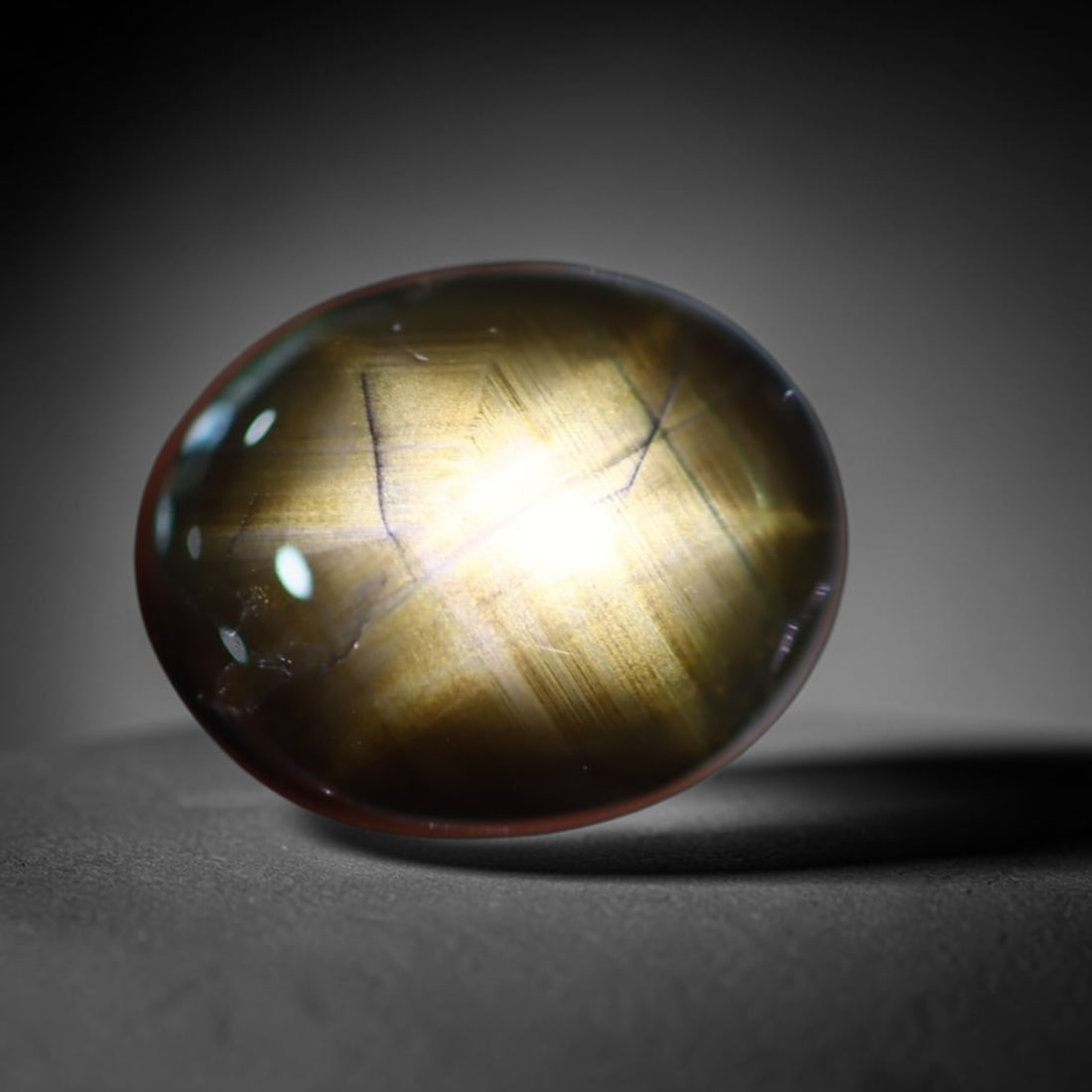 6.60Ct 6 Rays Black Star Sapphire - Polished Cabochon , 179E: Ksmith Heritage Auctioneers Subject: Natural 6 Rays Star Sapphire Origin: Myanmar Carat Weight: 6.60Ct Dimension: 11.2x9.2x5 mm Treatment: Diffusion Shape: Round Typ