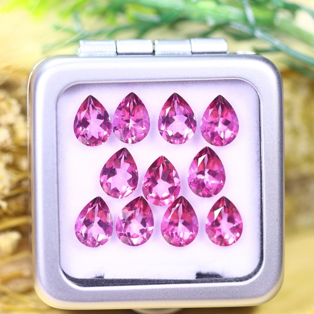 *13.38cts Natural Pink Topaz Set - Polished Faceted , 8x6mm, 68C: Ksmith Heritage AuctioneersSubject: Natural Topaz (without box) Origin: Myanmar Treatment: Coated