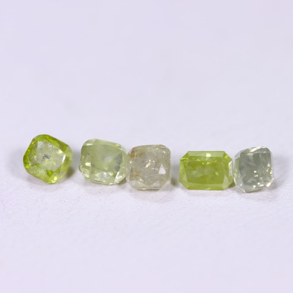 1.02Ct Fancy Diamond Set - Polished Faceted , 955E: Ksmith Heritage Auctioneers Subject: Natural Diamond Origin: Africa Carat Weight: 1.02Ct Dimension: 3.6x2.6x2.1 mm Treatment: Unheated Type: Faceted, Polished