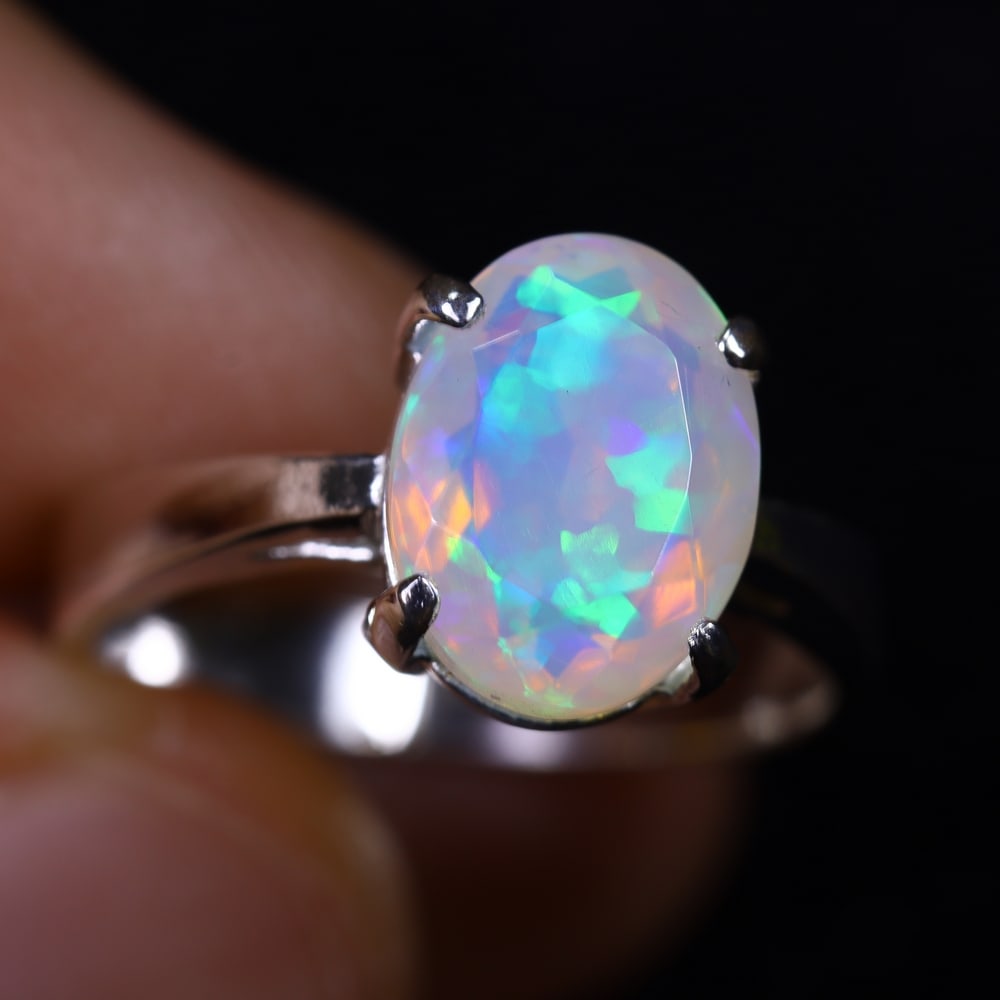 3.26g Natural Opal Stone Sterling Silver 925 Ring (Adjustable) , 917E: Ksmith Heritage Auctioneers Subject: Natural Ethiopian Opal Ring (Silver 925) Origin: Ethiopia Stone Dimension: 11x8mm Treatment: Natural Untreated Type: Faceted, Polished
