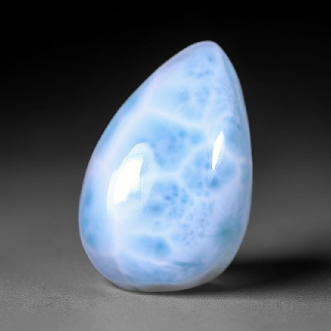 *19.74cts Natural Larimar - Polished Cabochon, 244B: Ksmith Heritage Auctioneers Subject: Natural Larimar Carat Weight: 19.74 cts Dimension: 22.5x14.6x7.2 mm Type: Cabochon, Polished