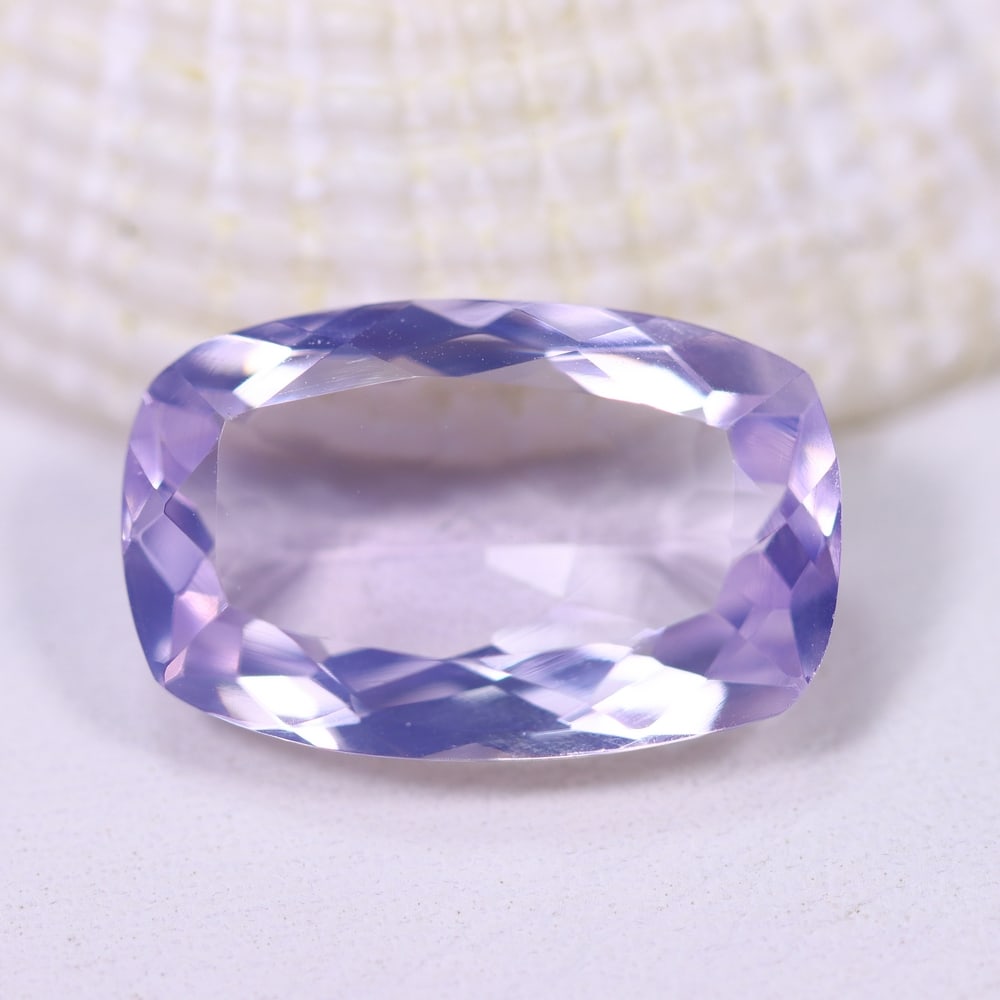 6.22Ct Lavender Amethyst - Polished Faceted , 915E: Ksmith Heritage Auctioneers Subject: Natural Lavender Amethyst Origin: Brazil Carat Weight: 6.22Ct Dimension: 15.7x10.2x5.5 mm Treatment: Untreated Type: Faceted, Polished