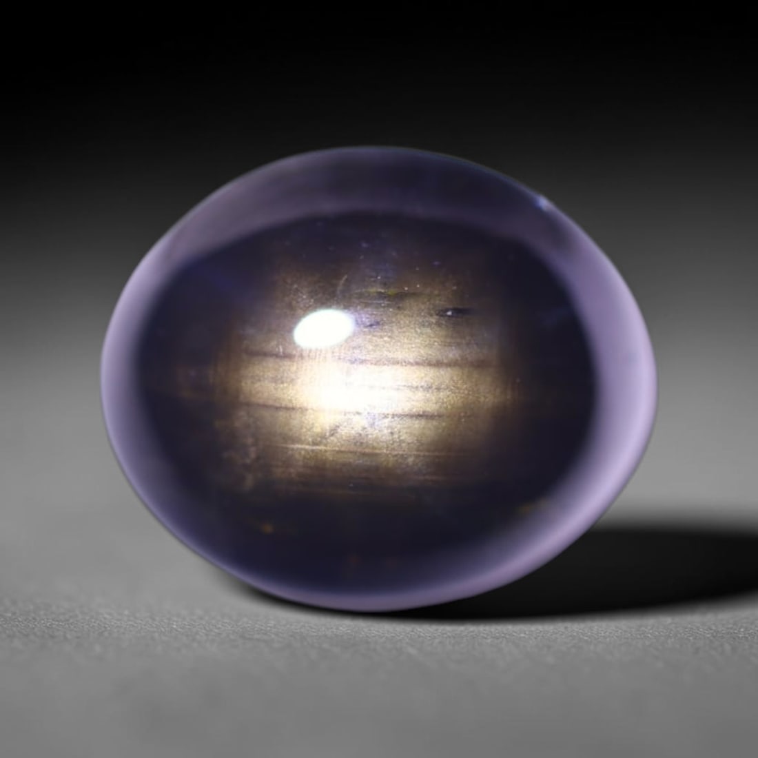 5.72cts 6 Rays Black Star Sapphire , 380E: Ksmith Heritage Auctioneers Subject: Natural 6 Rays Star Sapphire Origin: Myanmar Carat Weight: 5.72cts Dimension: 10.5x8.7x5.4 mm Treatment: Diffusion Type: Cabochon, Pol
