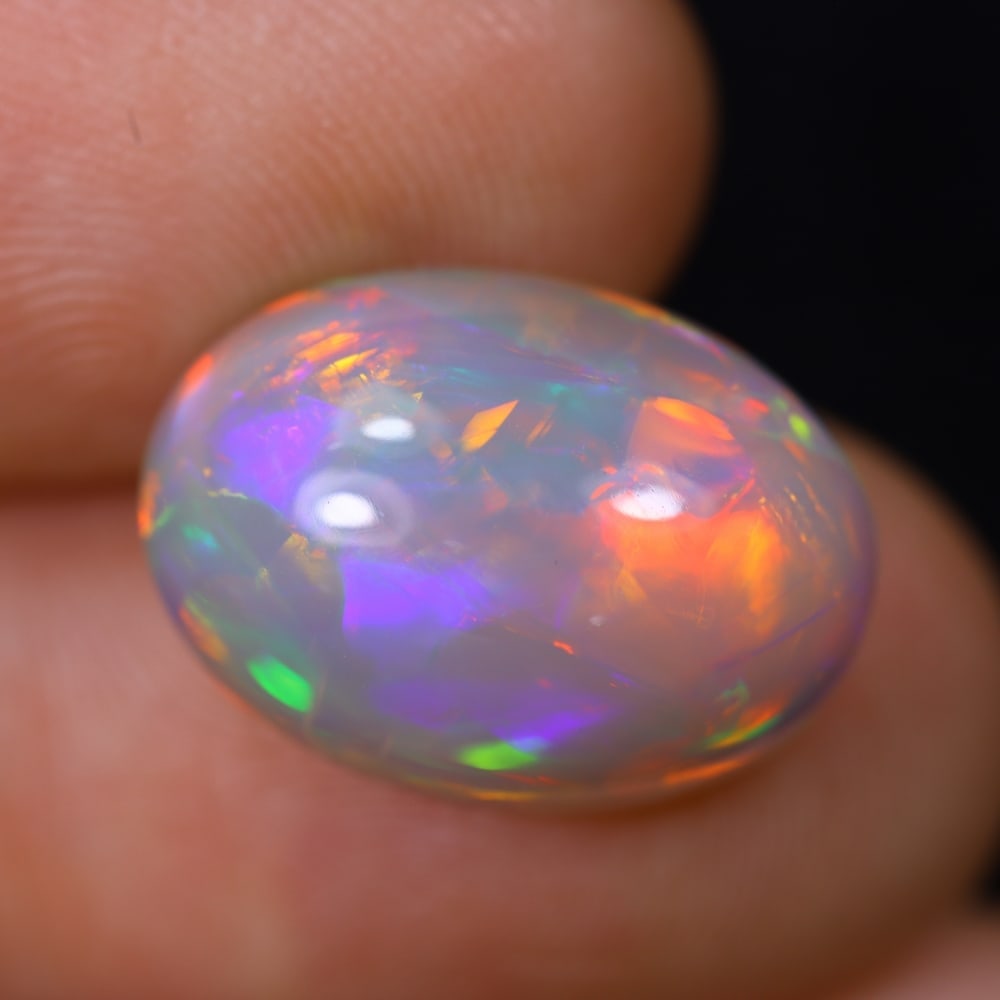 *5.47Ct Welo Opal Polished - Ethiopian Opal, 528B: Ksmith Heritage Auctioneers Subject: Natural Ethiopian Welo Opal Origin: Ethiopia Carat Weight: 5.47Ct Dimension: 15.7x11.4x6.3 mm Treatment: Natural Untreated Type: Cabochon,