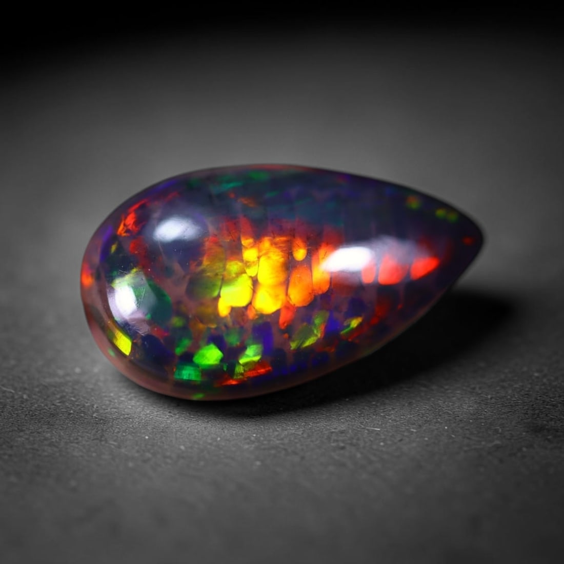 *3.21Ct Smoked Welo Opal Polished - Ethiopian Opal , 315C: Ksmith Heritage Auctioneers Subject: Natural Ethiopian Welo Opal Origin: Ethiopia Carat Weight: 3.21Ct Dimension: 15.5x9x4.7 mm Treatment: Smoked Type: Cabochon, Polished<