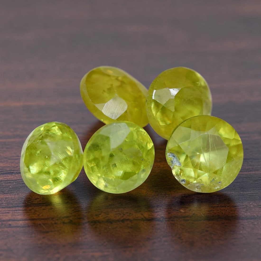 Sphene 1.12Ct Natural Round Cut Unheated Yellowish Green Sphene Lot, 1060MZ: Ksmith Jewels Global Welcome to our auction house, today auction brought to you by Ksmith Jewels Global based in Penang, Malaysia specialize in all kinds of opal and color gemstone both in manufacturi