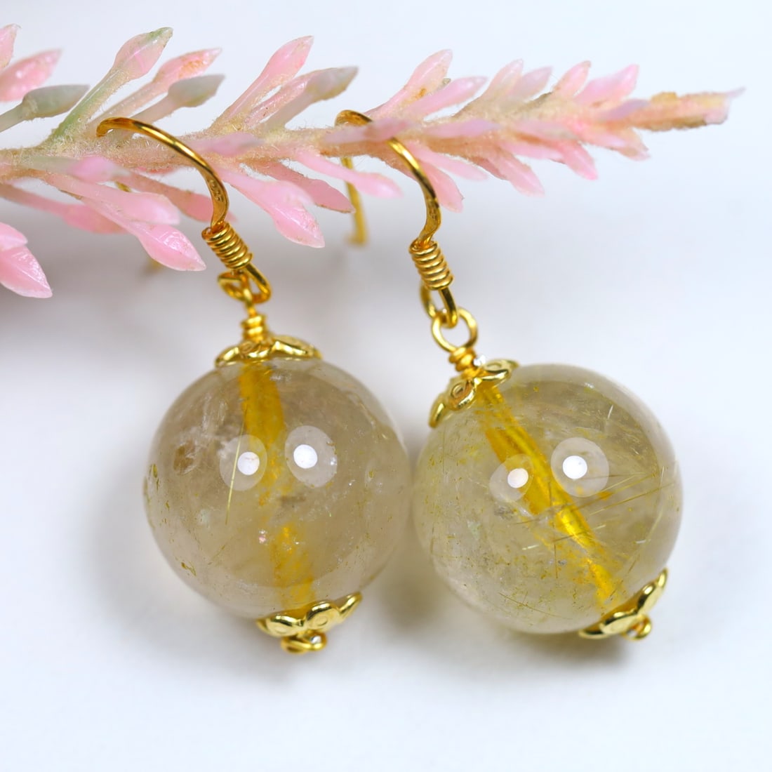 42.18Cts Natural 925 Sterling Silver 14 MM. Colorless Golden Rutile Quartz Earrings, 501B: Ksmith Jewels Global Welcome to our auction house, today auction brought to you by Ksmith Jewels Global based in Penang, Malaysia specialize in all kinds of opal and color gemstone both in manufacturi