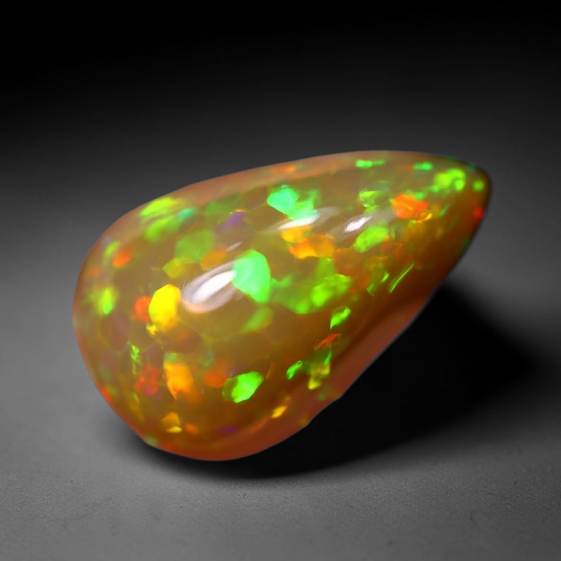 *5.63Ct Welo Opal Polished - Ethiopian Opal, 573B: Ksmith Heritage Auctioneers Subject: Natural Ethiopian Welo Opal Origin: Ethiopia Carat Weight: 5.63Ct Dimension: 16.5x10.1x7.6 mm Treatment: Natural Untreated Type: Cabochon,