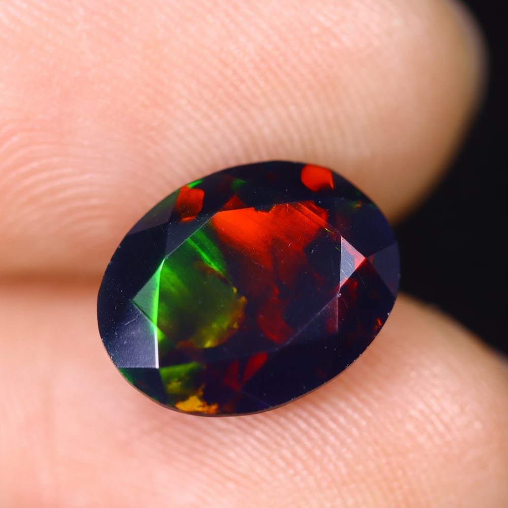 1.95Ct Ethiopian Black Smoked Opal, Faceted Cut - 11.2x8.8x5.5 mm , 624C: Ksmith Heritage Auctioneers Subject: Natural Ethiopian Welo Opal Origin: Ethiopia Treatment: Smoked