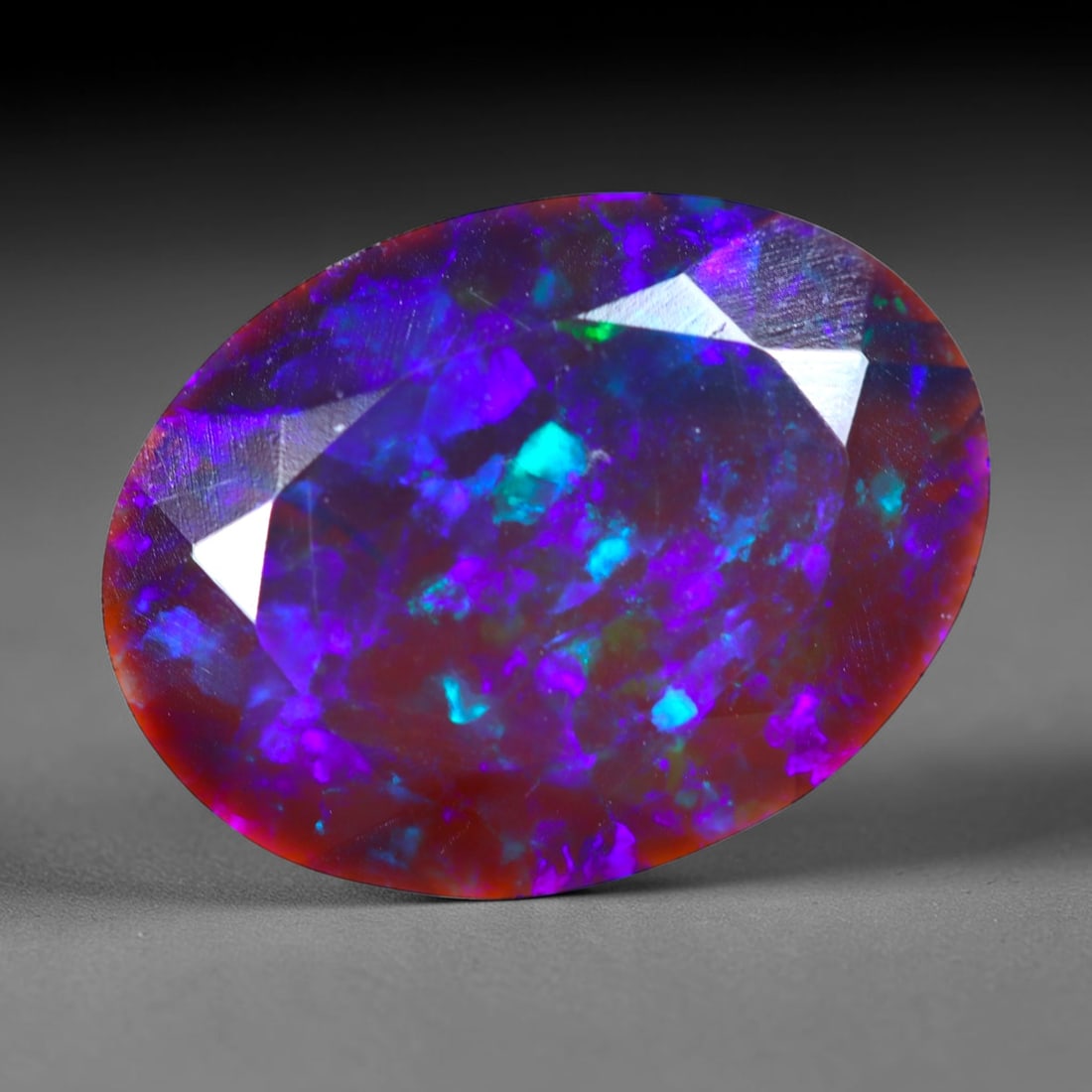 2.28Ct Natural Smoked Ethiopian Black Opal, Faceted Cut - 13.5x10.1x3.8 mm , 691C: Ksmith Heritage Auctioneers Subject: Natural Ethiopian Welo Opal Origin: Ethiopia Treatment: Smoked
