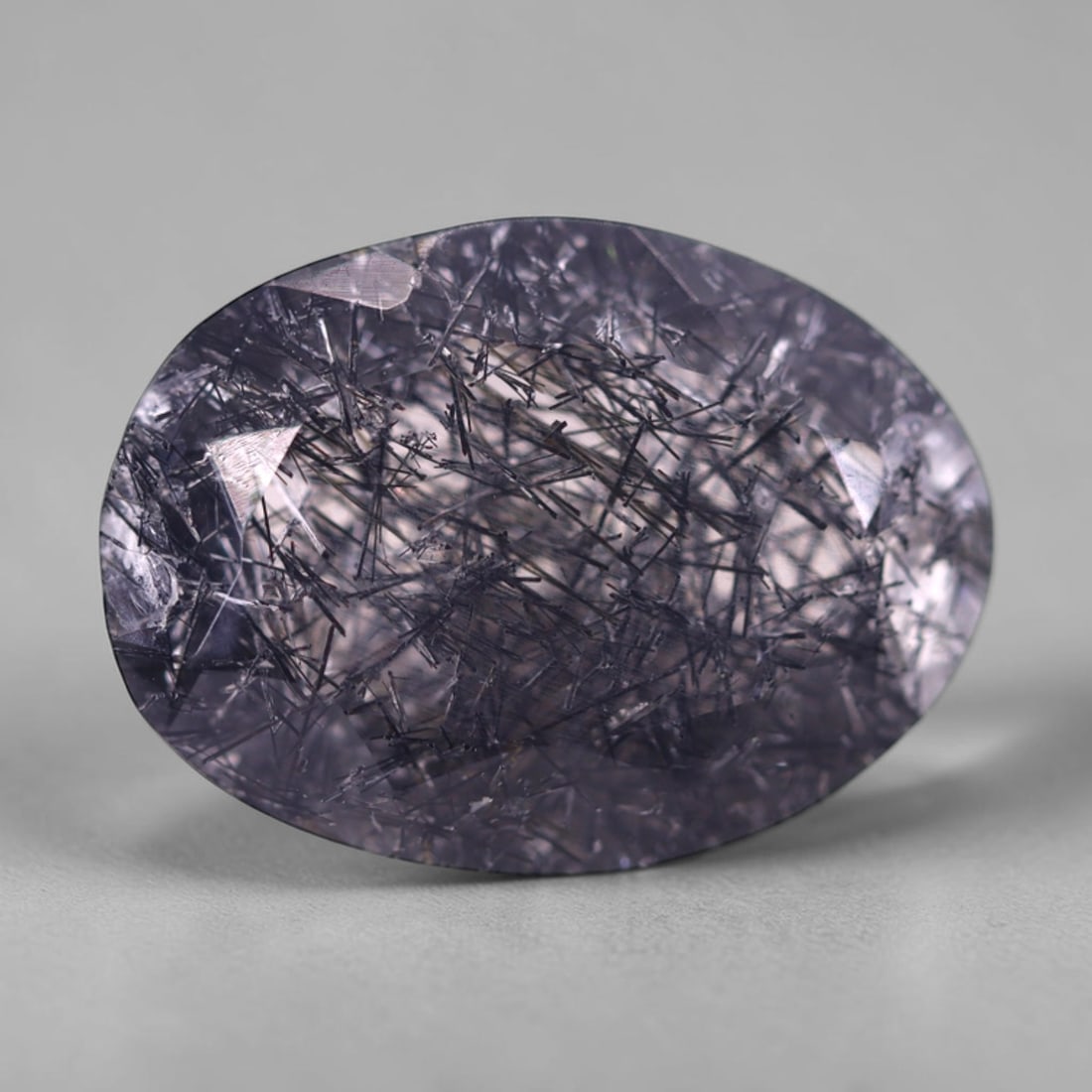 *12.63Ct Black Rutiled Quartz - Polished Faceted , 250C: Ksmith Heritage Auctioneers Subject: Natural Black Rutiled Quartz Carat Weight: 12.63 Ct Dimension: 18.6x13.7x8.1 mm