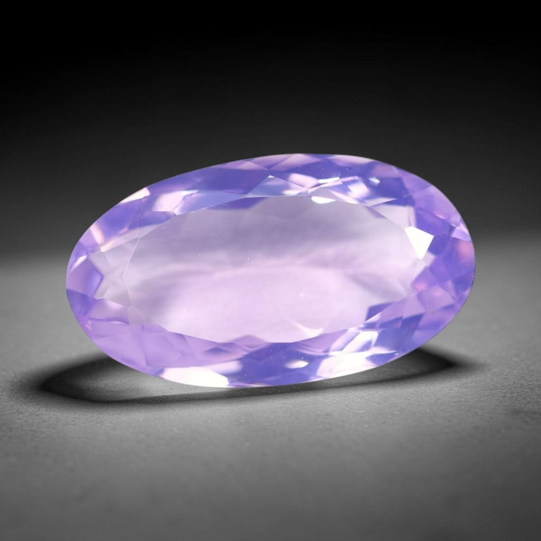 14.09Ct Lavender Amethyst - Polished Faceted , 635E: Ksmith Heritage Auctioneers Subject: Natural Lavender Amethyst Origin: Brazil Carat Weight: 14.09Ct Dimension: 22.9x12.7x7.5 mm Treatment: Untreated Type: Faceted, Polishe