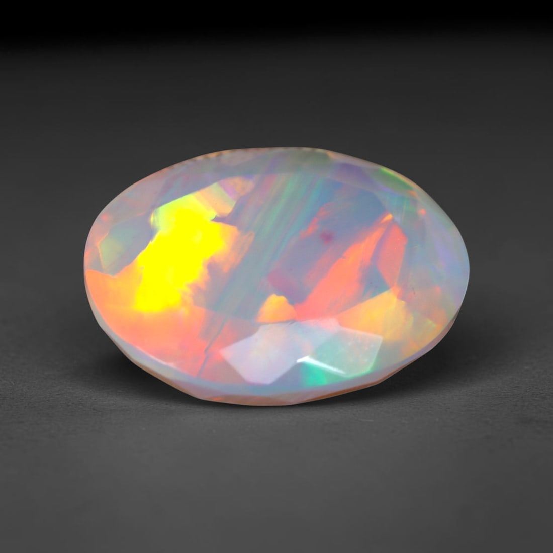 2.82Ct Natural Ethiopian Opal, Faceted Cut - 12.1x10.0x5.8 mm , 649C: Ksmith Heritage Auctioneers Subject: Natural Ethiopian Welo Opal Origin: Ethiopia Treatment: Unheated