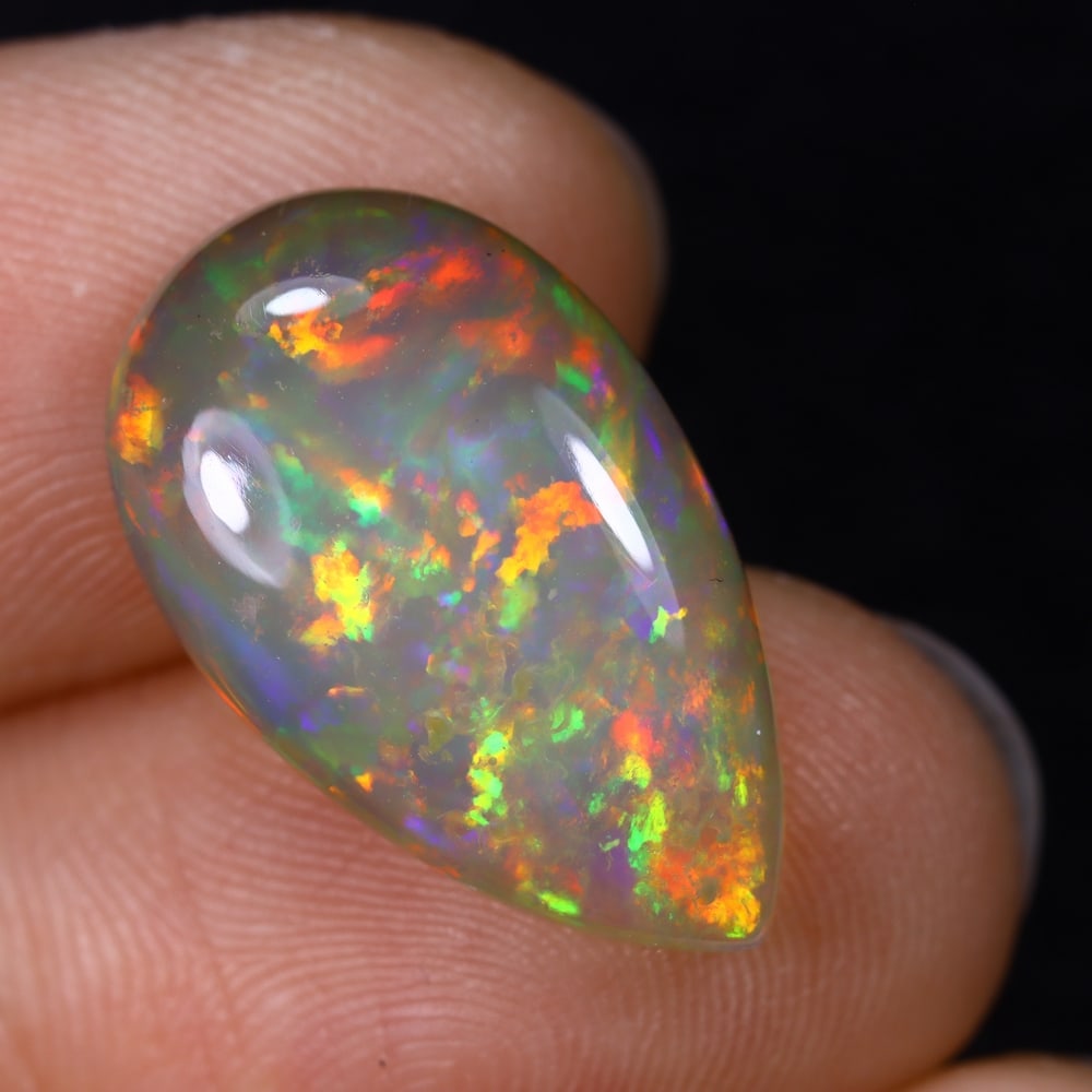 6.81Ct Natural Ethiopian Opal - 19.6x11.7x5.7 mm , 546C: Ksmith Heritage Auctioneers Subject: Natural Ethiopian Welo Opal Origin: Ethiopia Treatment: Unheated