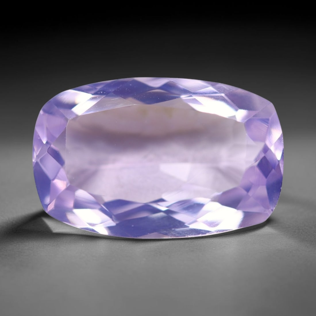6.22Ct Lavender Amethyst - Polished Faceted , 915E: Ksmith Heritage Auctioneers Subject: Natural Lavender Amethyst Origin: Brazil Carat Weight: 6.22Ct Dimension: 15.7x10.2x5.5 mm Treatment: Untreated Type: Faceted, Polished