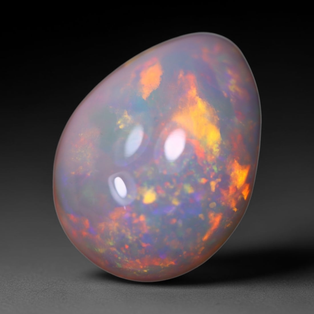 *7.24Ct Welo Opal Polished - Ethiopian Opal - Pear Cabochon, 1072B: Ksmith Heritage Auctioneers Subject: Natural Ethiopian Welo Opal Origin: Ethiopia Carat Weight: 7.24Ct Dimension: 17 x 12.7 x 7 mm Treatment: Natural Untreated Shape: Pear