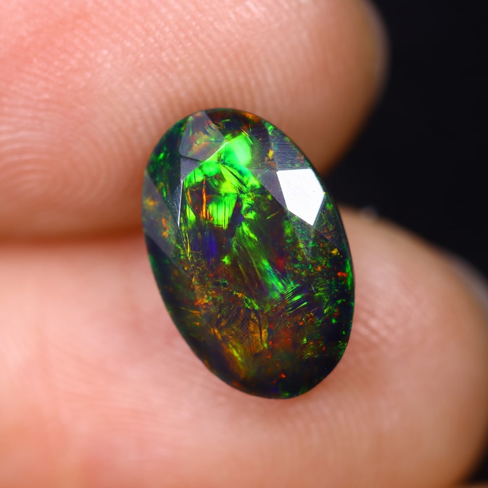 1.98Ct Ethiopian Black Smoked Opal, Faceted Cut - 11.9x7.7x4.7 mm , 630C: Ksmith Heritage Auctioneers Subject: Natural Ethiopian Welo Opal Origin: Ethiopia Treatment: Smoked