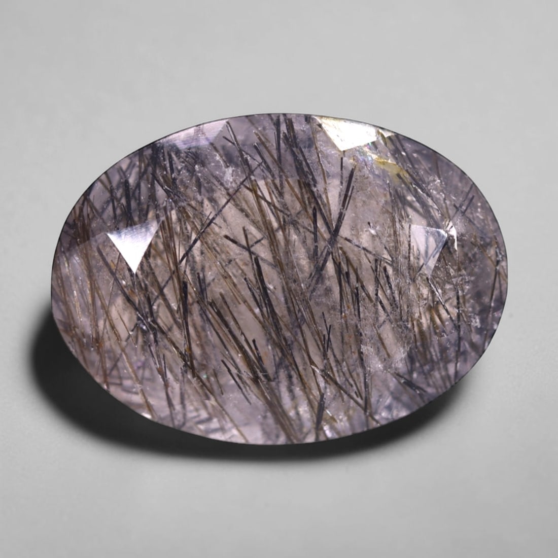 *10.04Ct Black Rutiled Quartz - Polished Faceted , 254C: Ksmith Heritage Auctioneers Subject: Natural Black Rutiled Quartz Carat Weight: 10.04 Ct Dimension: 18.2x13.2x7.1 mm