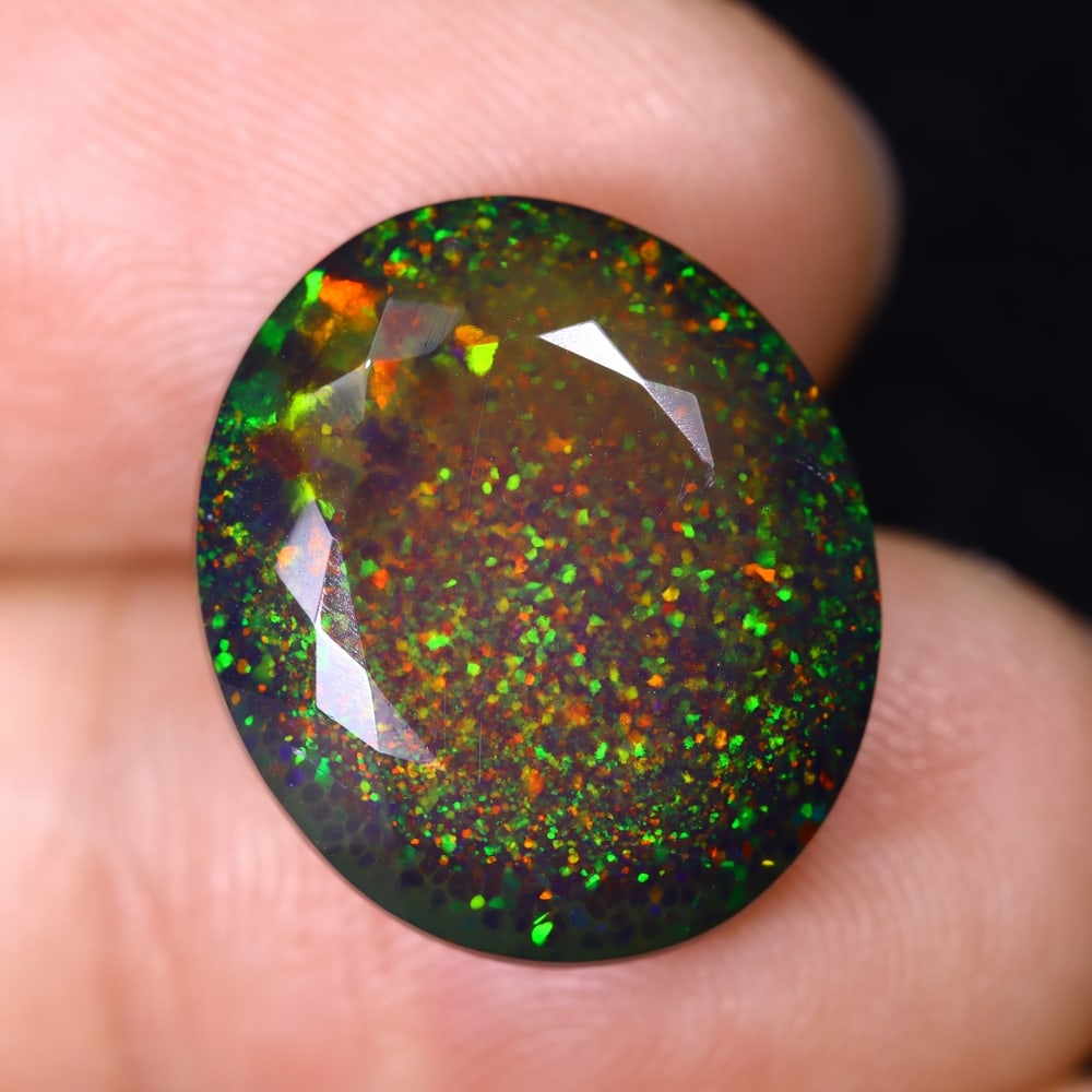 8.70Ct Smoked Faceted Ethiopian Opal - 17.0x14.6x7.7 mm , 529C: Ksmith Heritage Auctioneers Subject: Natural Ethiopian Welo Opal Origin: Ethiopia Treatment: Smoked Type: Faceted, Polished