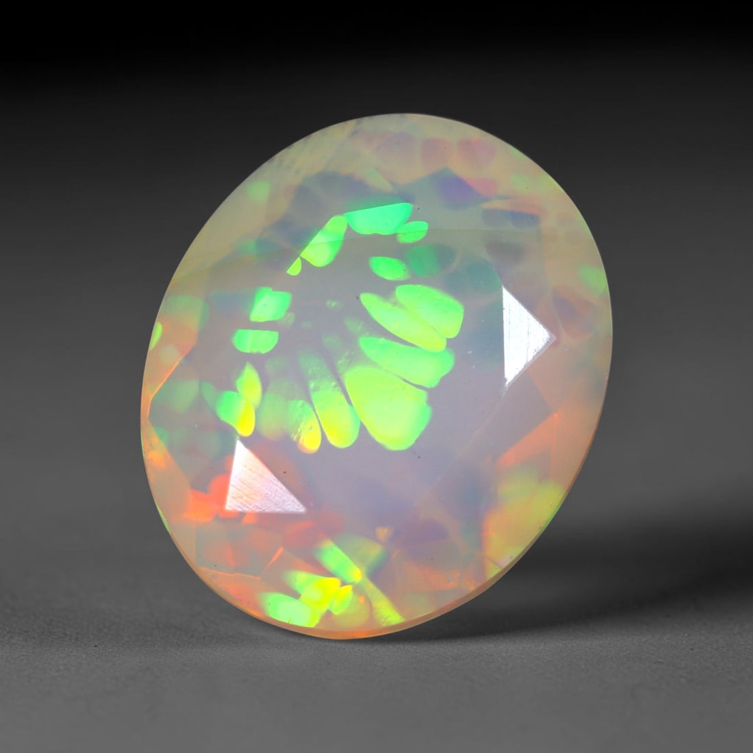 3.05Ct Natural Ethiopian Opal, Faceted Cut - 12.0x10.0x5.9 mm , 651C: Ksmith Heritage Auctioneers Subject: Natural Ethiopian Welo Opal Origin: Ethiopia Treatment: Unheated