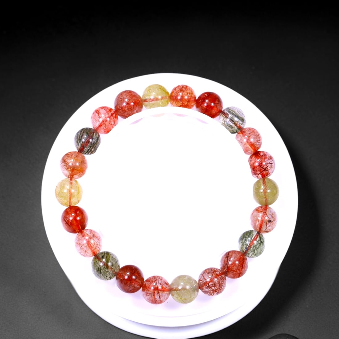 19.70g Rutilate Bracelet - Polished Beads , 831E: Ksmith Heritage Auctioneers Subject: Natural Rutilate Carat Weight: 19.70g
