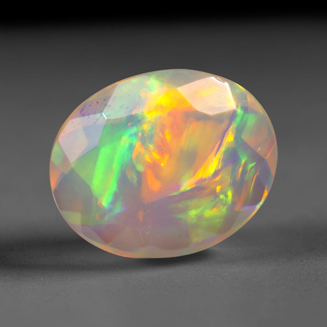 2.04Ct Natural Ethiopian Opal, Faceted Cut - 12.1x10.0x5.0 mm , 683C: Ksmith Heritage Auctioneers Subject: Natural Ethiopian Welo Opal Origin: Ethiopia Treatment: Unheated
