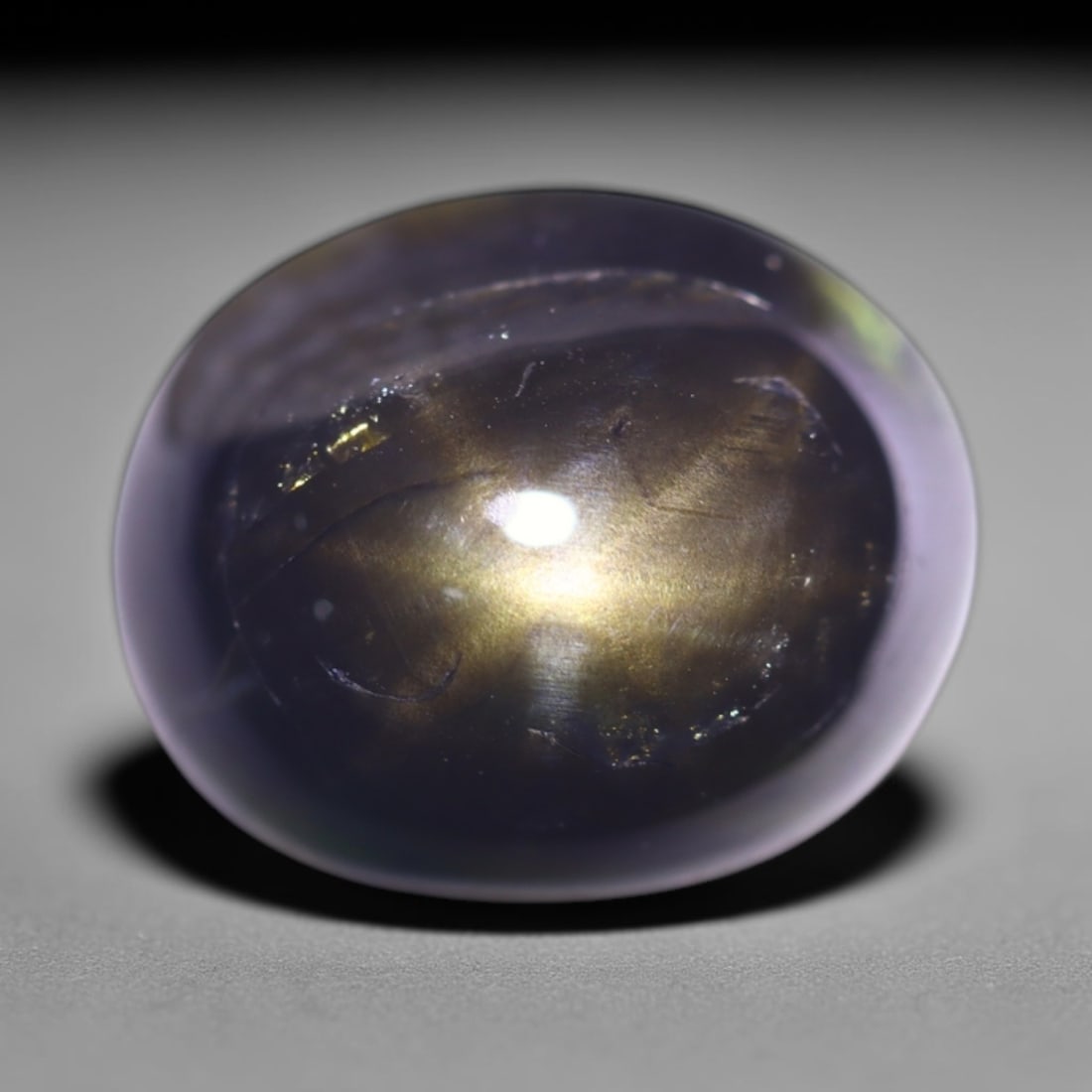 3.71cts 6 Rays Black Star Sapphire , 668E: Ksmith Heritage Auctioneers Subject: Natural 6 Rays Star Sapphire Origin: Myanmar Carat Weight: 3.71cts Dimension: 9.7x7.9x4.5 mm Treatment: Diffusion Type: Cabochon, Poli