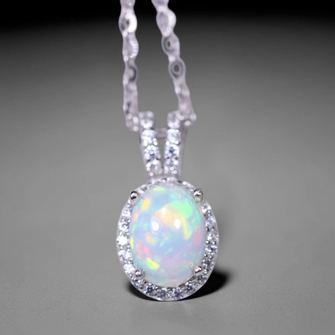 18inches Necklace Fire Opal & Simulated CZ - 925 Sterling Silver , 780E: Ksmith Heritage Auctioneers Subject: Natural Fire Opa & Simulated CZ Origin: Thailand Carat Weight: 2.3g Dimension: Gemstone 6x8mm Type: Necklace