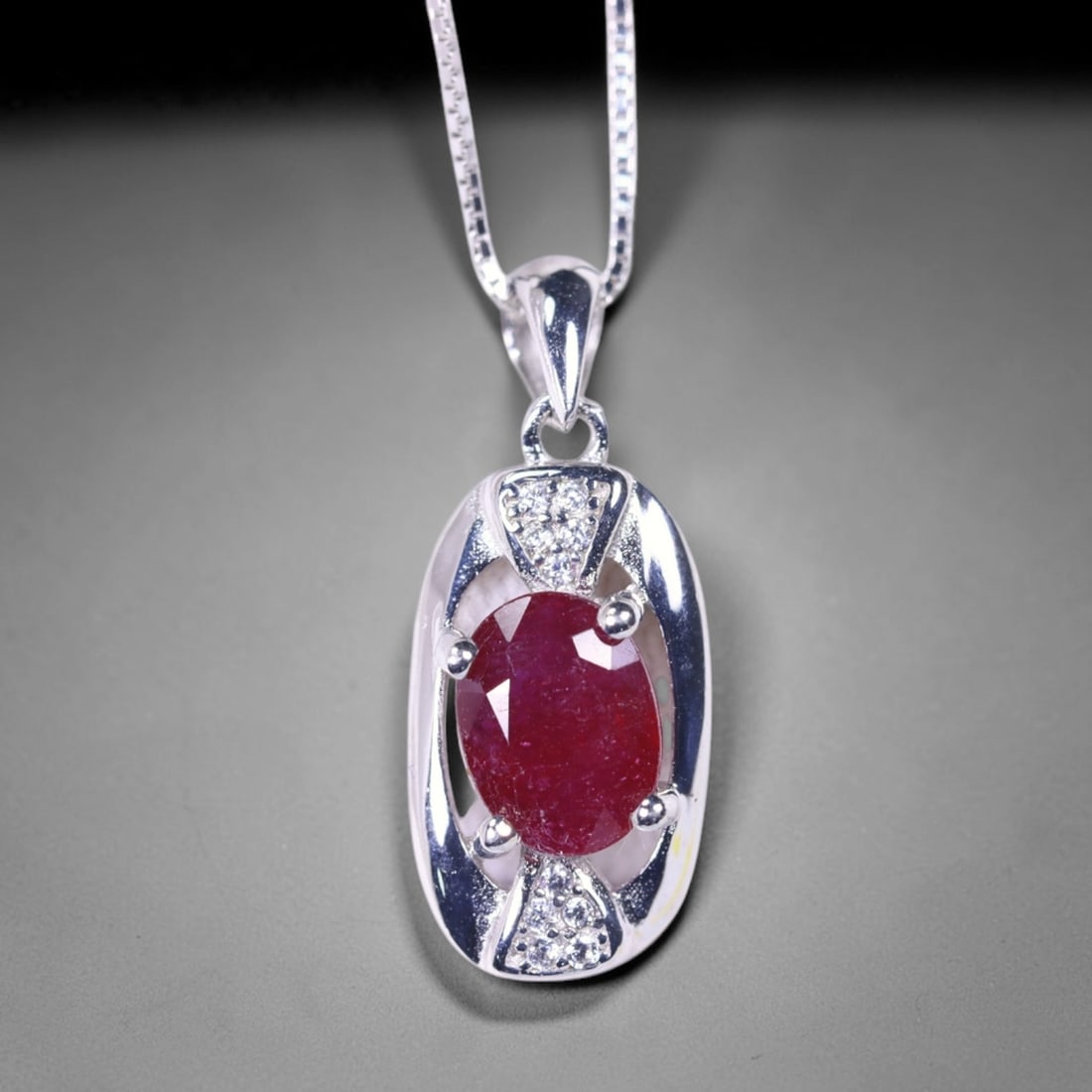 Necklace 18inches Ruby & Simulated CZ - 925 Sterling Silver , 798E: Ksmith Heritage Auctioneers Subject: Natural Ruby & Simulated CZ Origin: Thailand Carat Weight: 2.71g Dimension: Gemstone 6x8mm Type: Necklace