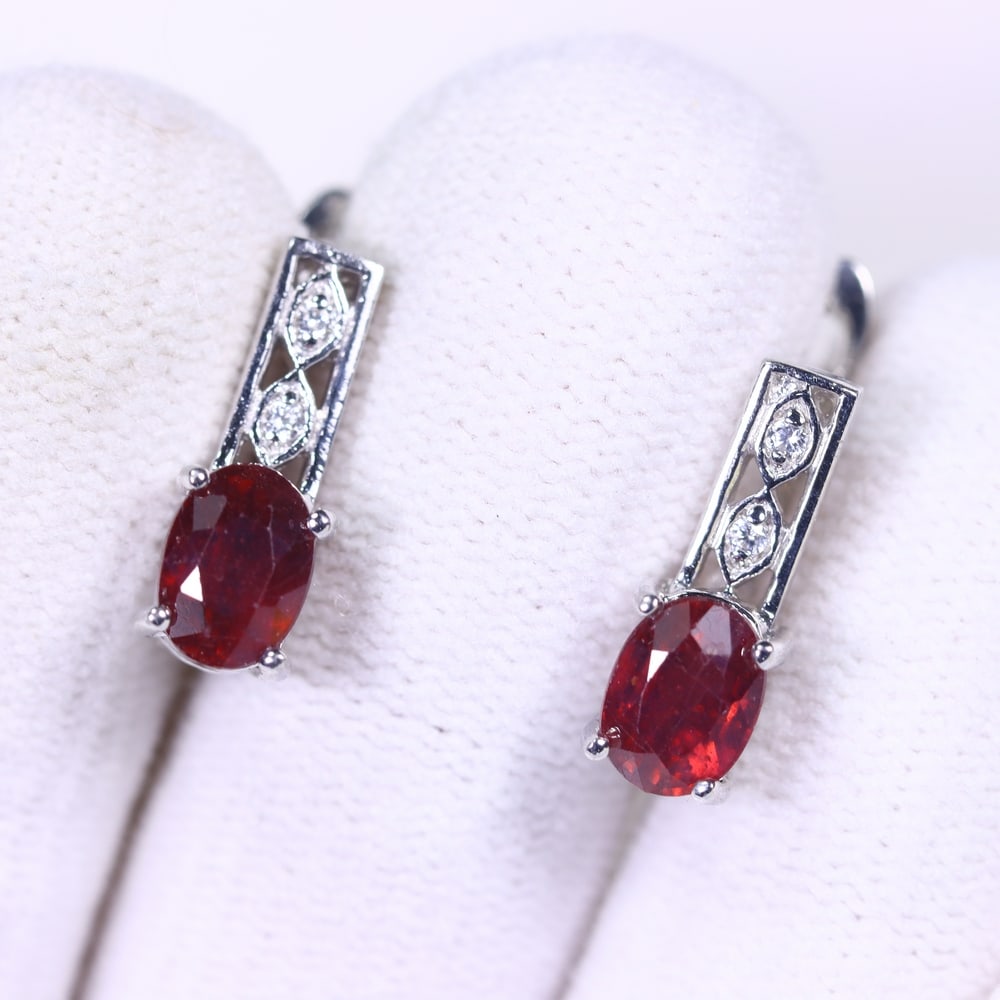 Earrings Ruby & Simulated CZ - 925 Sterling Silver, 158B: Ksmith Heritage Auctioneers Subject: Natural Ruby & Simulated CZ Origin: Thailand Carat Weight: 4.09g Dimension: Gemstone 5x7mm Type: Earrings