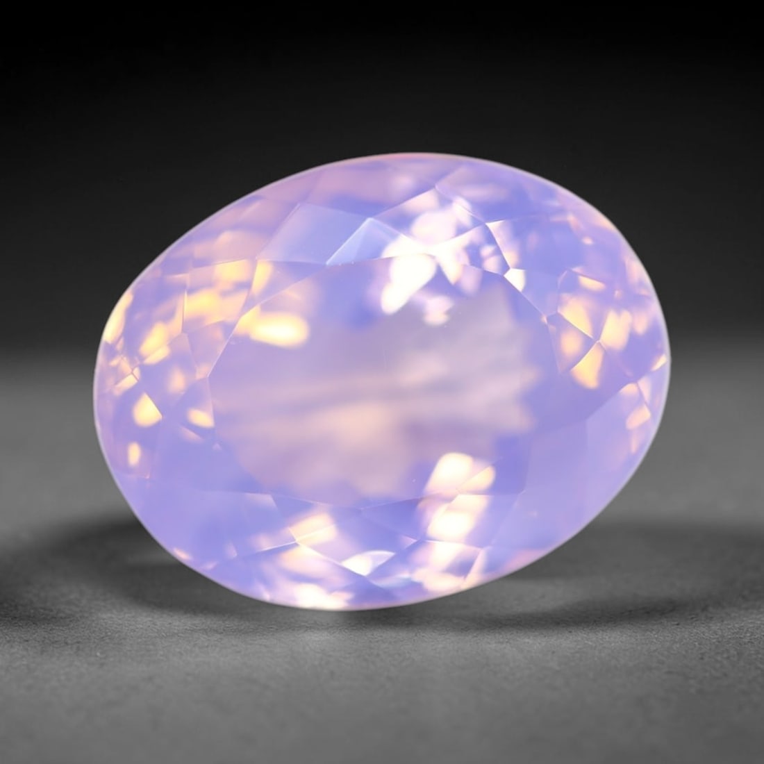 18.12Ct Lavender Amethyst - Polished Faceted , 309E: Ksmith Heritage Auctioneers Subject: Natural Lavender Amethyst Origin: Brazil Carat Weight: 18.12Ct Dimension: 18.6x14.4x11.2 mm Treatment: Untreated Type: Faceted, Polish