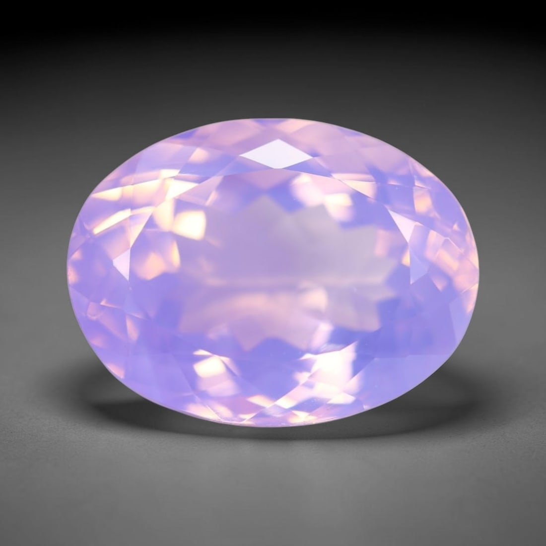 18.51Ct Lavender Amethyst - Polished Faceted , 582E: Ksmith Heritage Auctioneers Subject: Natural Lavender Amethyst Origin: Brazil Carat Weight: 18.51Ct Dimension: 19.6x14.8x10.8 mm Treatment: Untreated Type: Faceted, Polish