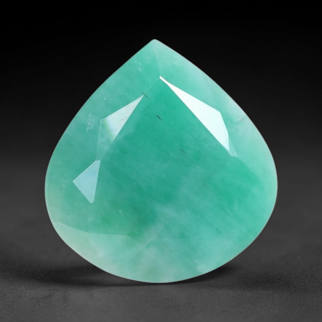 *27.67Ct Brazilian Sakota Emerald - Polished Faceted , 218C: Ksmith Heritage Auctioneers Subject: Natural Sakota Emerald Origin: Brazil Carat Weight: 27.67Ct Dimension: 21x20.2x11.4 mm Treatment: Oiled Type: Faceted, Polished