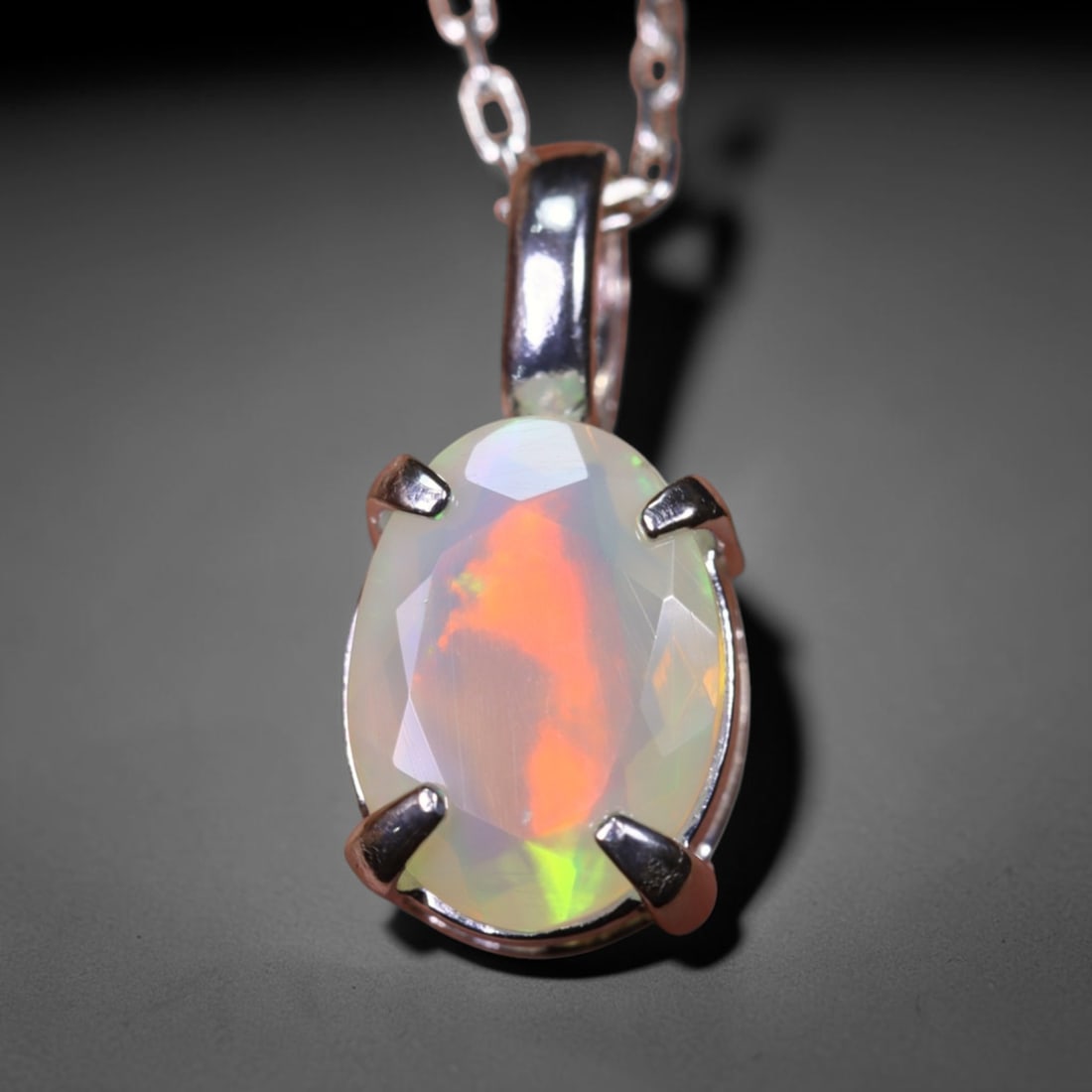 1.66g Natural Opal Stone Sterling Silver 925 Necklace (Pendant with Chain) , 869E: Ksmith Heritage Auctioneers Subject: Natural Ethiopian Opal Necklace Origin: Ethiopia Pendant Dimension : 18x6mm (included clasp) Stone Dimension: 11x8mm Treatment: Natural Untrea