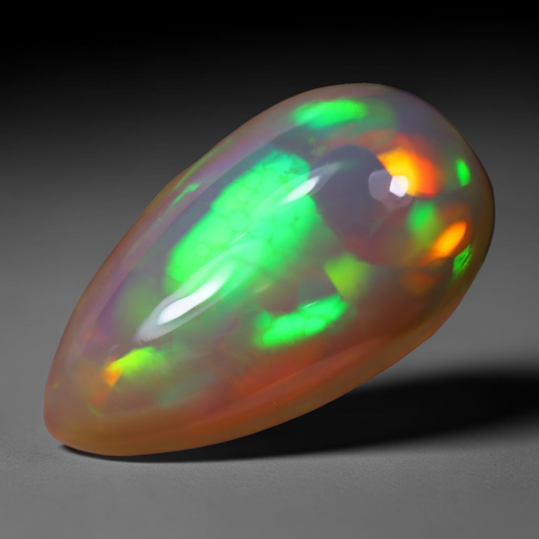 *4.27Ct Welo Opal Polished - Ethiopian Opal, 1125B: Ksmith Heritage Auctioneers Subject: Natural Ethiopian Welo Opal Origin: Ethiopia Carat Weight: 4.27Ct Dimension: 16.3x9.1x6.1 mm Treatment: Natural Untreated Type: Cabochon, P