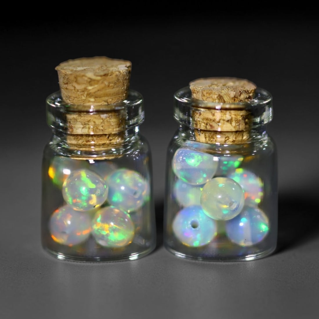 Twin Pack - 4.5mm Ethiopian Opal Ball in Display Jar - Bottle Size 1.5cm , 75C: Ksmith Heritage AuctioneersSubject: Natural Opal (with bottle) Origin: Ethiopia Treatment: Unheated