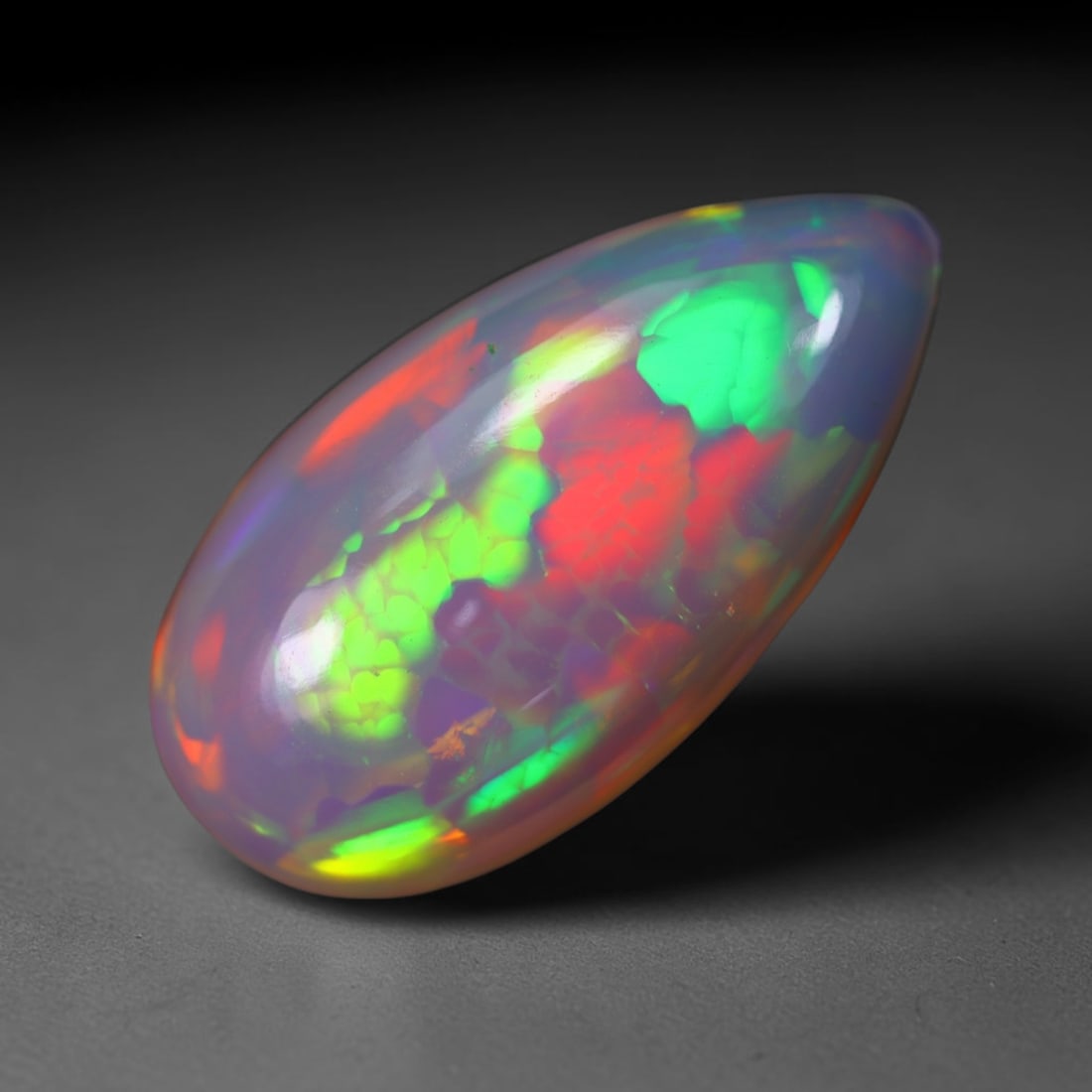 *8.50Ct Welo Opal Polished - Ethiopian Opal, 255B: Ksmith Heritage Auctioneers Subject: Natural Ethiopian Welo Opal Origin: Ethiopia Carat Weight: 8.50Ct Dimension: 22x11.5x7.5 mm Treatment: Natural Untreated Type: Cabochon, Po