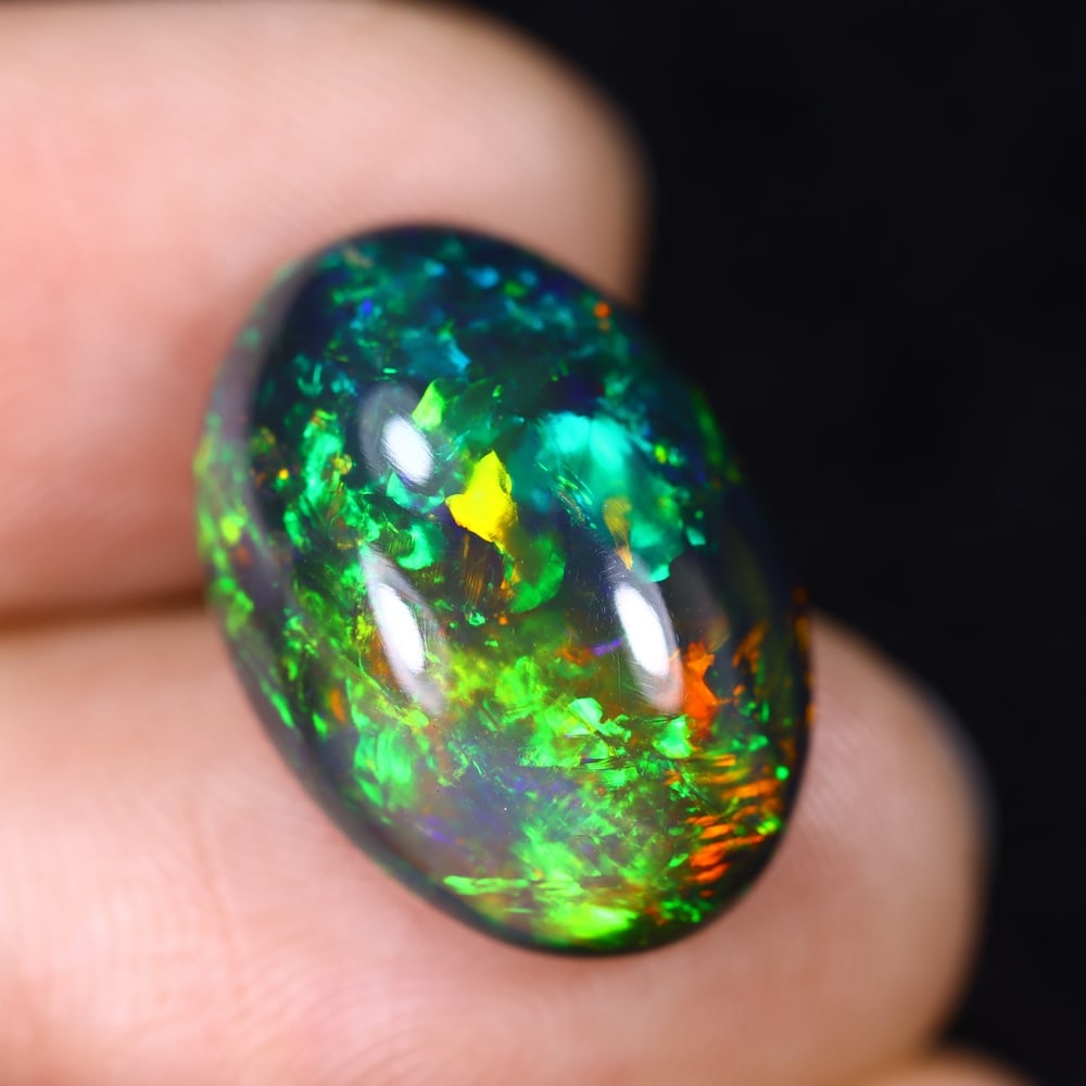 8.07Ct Natural Ethiopian Black Opal - 18.3x12.9x6.8 mm , 597C: Ksmith Heritage Auctioneers Subject: Natural Ethiopian Welo Opal Origin: Ethiopia Treatment: Smoked