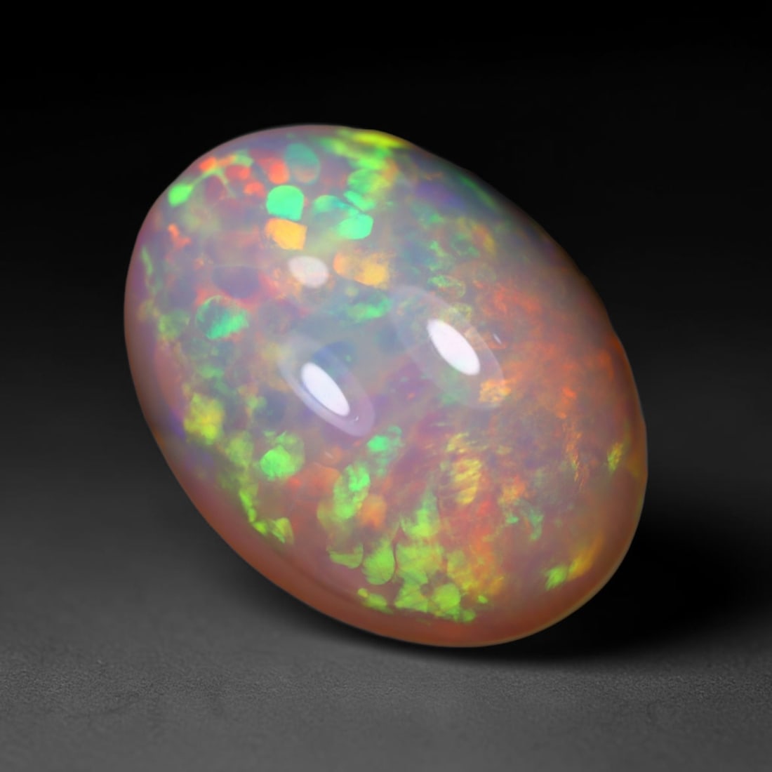 *8.06Ct Welo Opal Polished - Ethiopian Opal - Oval Cabochon, 614B: Ksmith Heritage Auctioneers Subject: Natural Ethiopian Welo Opal Origin: Ethiopia Carat Weight: 8.06Ct Dimension: 18.8 x 13.8 x 7.1 mm Treatment: Natural Untreated Shape: Oval