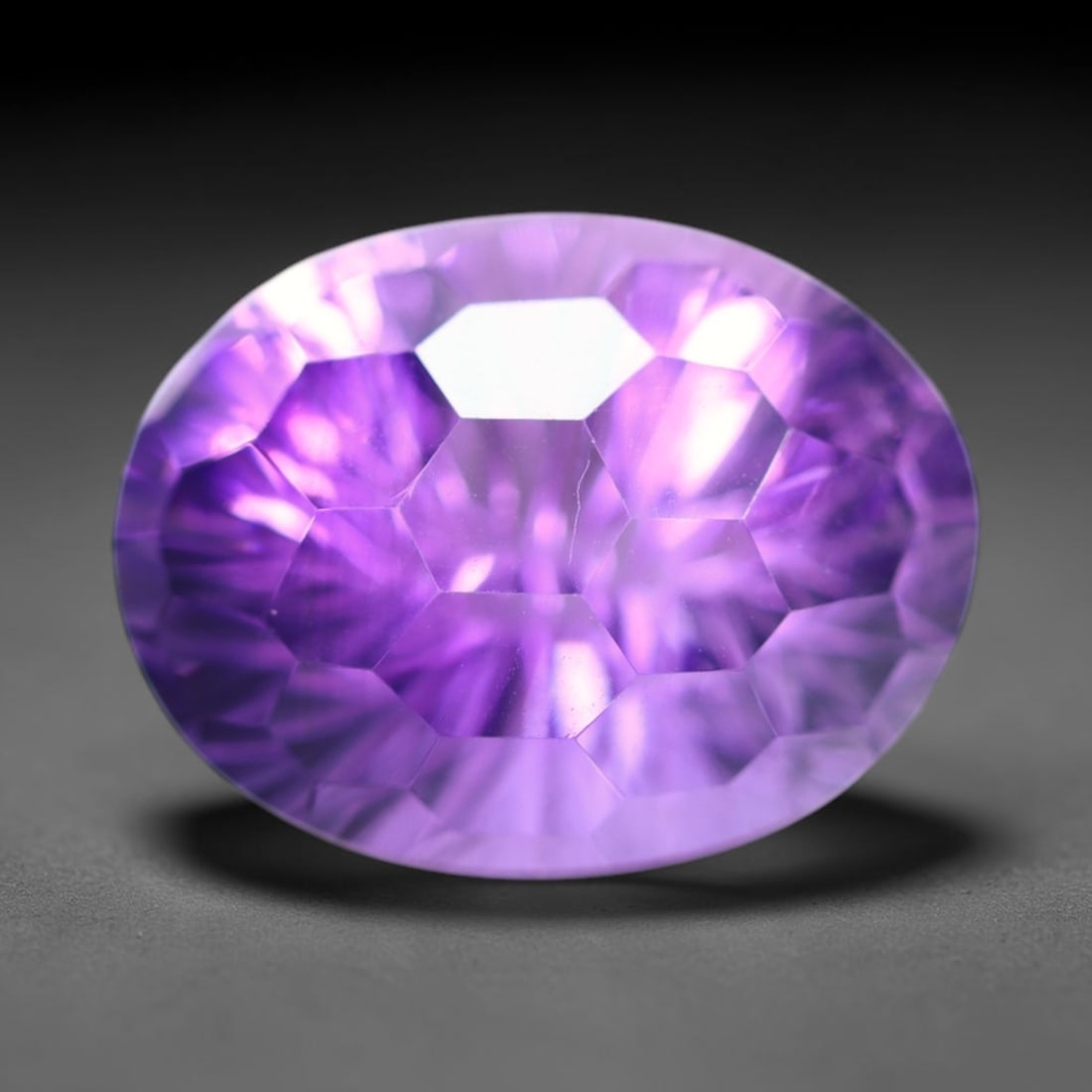 11.38Ct Purple Amethyst - Polished Faceted , 900E: Ksmith Heritage Auctioneers Subject: Natural Amethyst Origin: Brazil Carat Weight: 11.38Ct Dimension: 16.4x12.5x10.5 mm Treatment: Untreated Type: Faceted, Polished