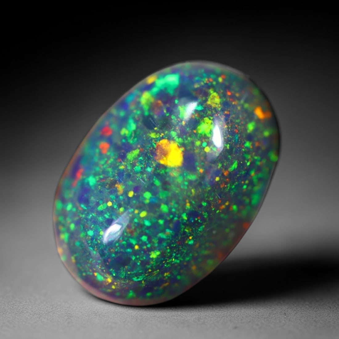 *2.01Ct Welo Black Opal Polished - Ethiopian Opal , 87E: Ksmith Heritage Auctioneers Subject: Natural Ethiopian Welo Black Opal Origin: Ethiopia Carat Weight: 2.01Ct Dimension: 11.6x8.1x4.3 mm Treatment: Smoked Type: Cabochon, P