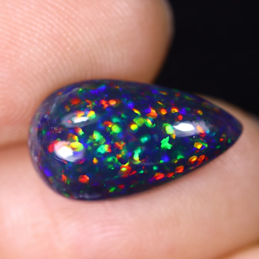 3.47Ct Natural Ethiopian Black Opal - 16.1x9.2x5.3 mm , 576C: Ksmith Heritage Auctioneers Subject: Natural Ethiopian Welo Opal Origin: Ethiopia Treatment: Smoked