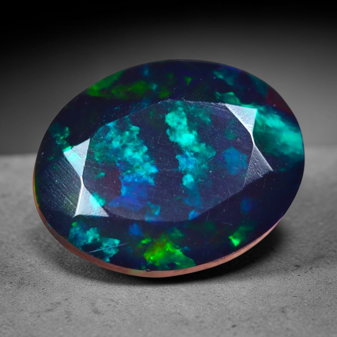 2.18Ct Natural Smoked Ethiopian Black Opal, Faceted Cut - 10.5x8.1x5.5 mm , 703C: Ksmith Heritage Auctioneers Subject: Natural Ethiopian Welo Opal Origin: Ethiopia Treatment: Smoked