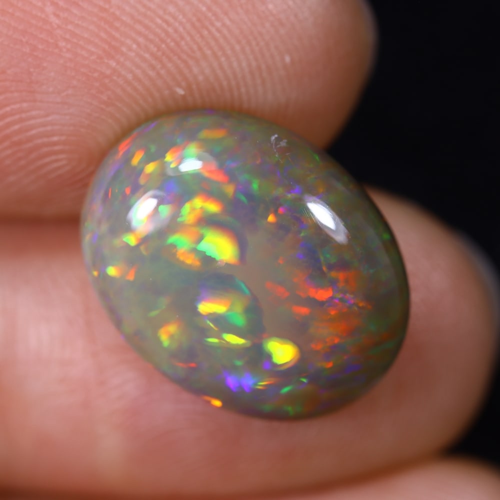 5.35Ct Natural Ethiopian Opal - 15.6x12.1x5.6 mm , 565C: Ksmith Heritage Auctioneers Subject: Natural Ethiopian Welo Opal Origin: Ethiopia Treatment: Unheated